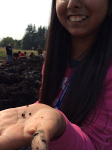 Student with rattlesnake vertebrae